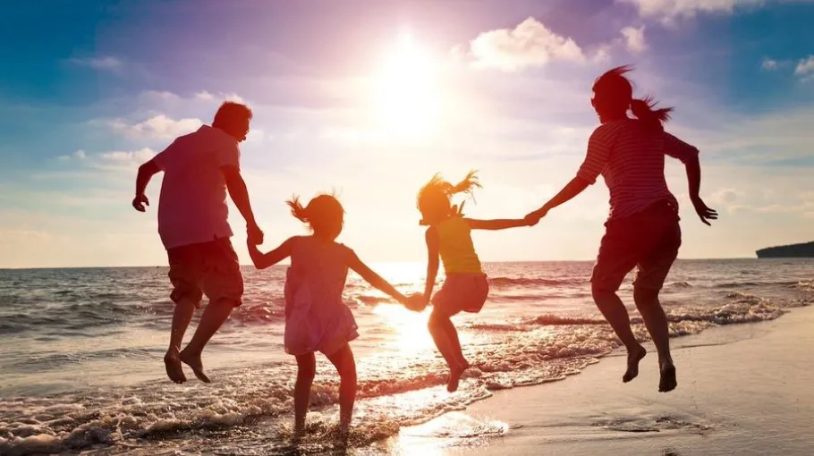 Family on the beach, Spain
